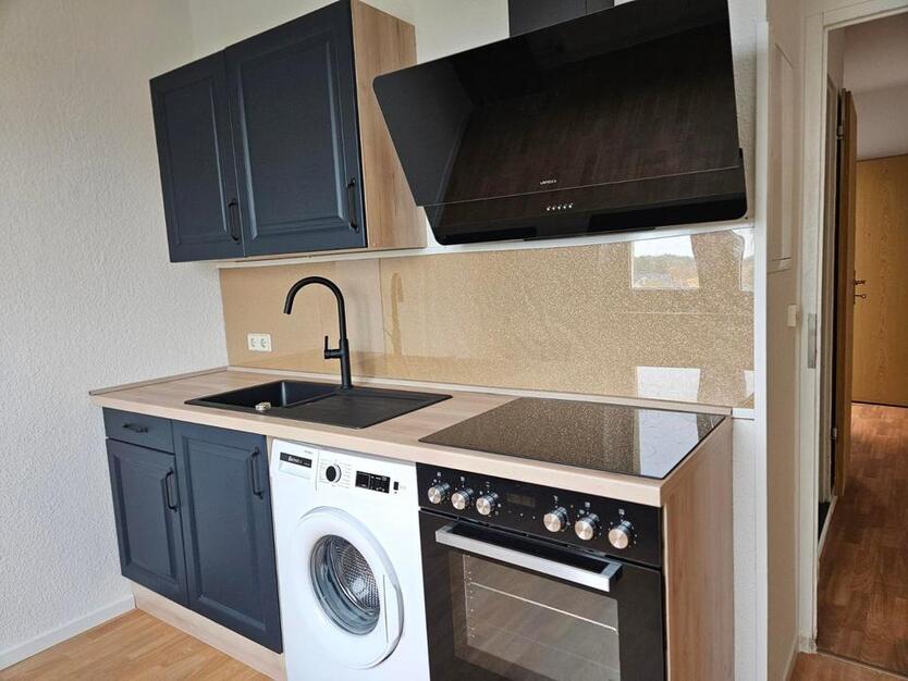 48 qm-große Ein-Zimmnerwohnung mit Einbauküche zum Verkauf zimmer