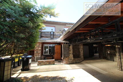 Einfamilienhaus mit Einliegerwohnung und Werkstatt in ruhiger grüner Lage in Forst 1 zimmer