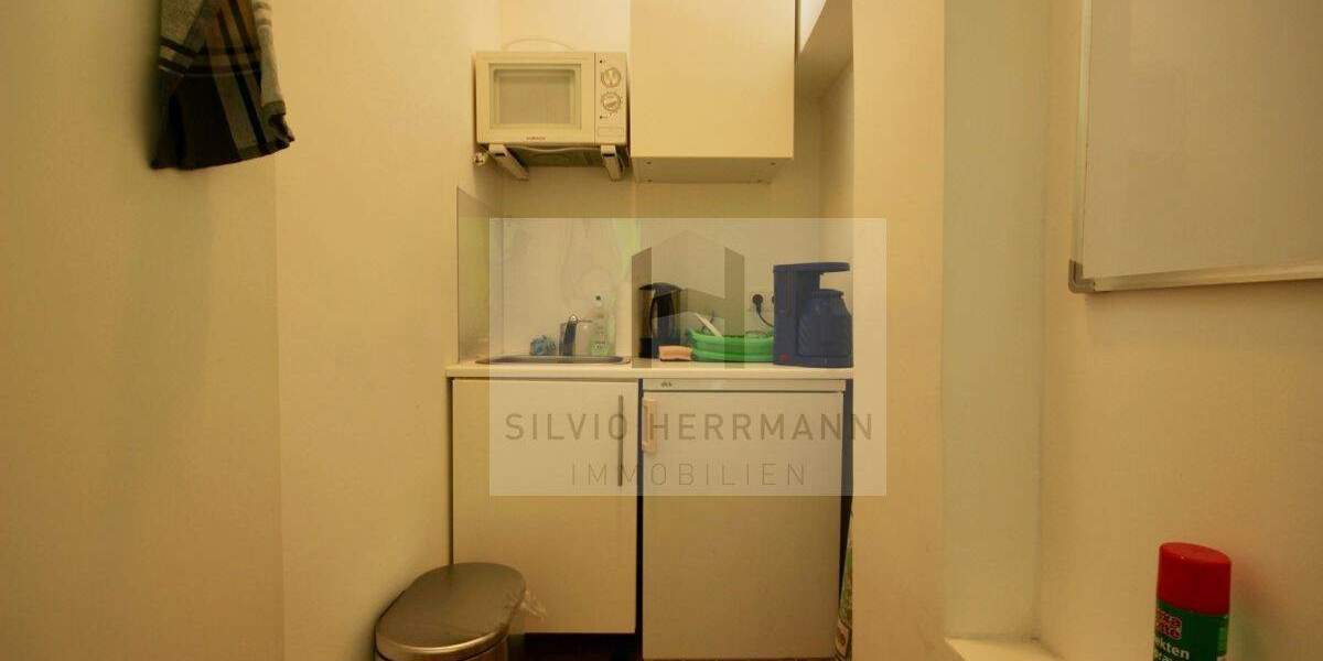 Vermietetes Wohn-und Geschäftshaus 1 zimmer