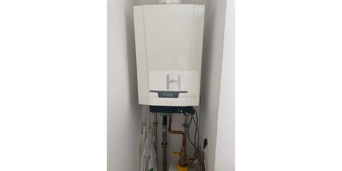 Vermietetes Wohn-und Geschäftshaus 1 zimmer