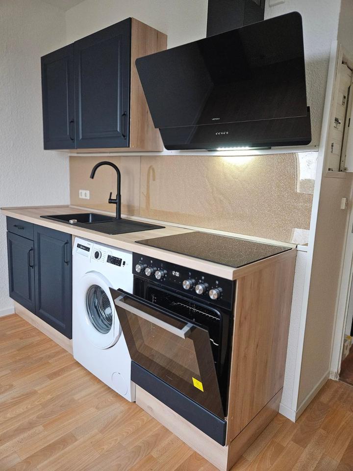 48 qm-große Ein-Zimmnerwohnung mit Einbauküche zum Verkauf zimmer