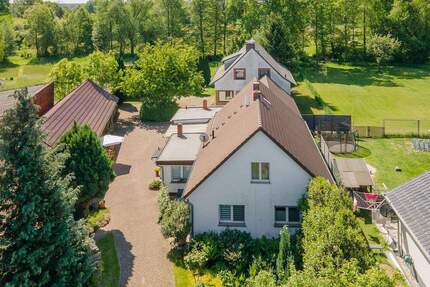 Einfamilienhaus, zwei Wohnungen und fantastisches Grundstück in Kolkwitz OT Babow - Am Kanal! 9 zimmer